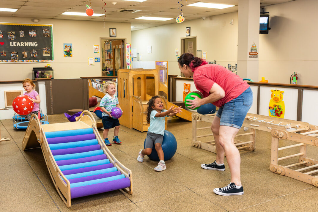 Children engaged in play-based learning activities at The Nurturing Nook Fox Point WI NAEYC-accredited preschool