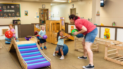 Children engaged in play-based learning activities at The Nurturing Nook Fox Point WI NAEYC-accredited preschool